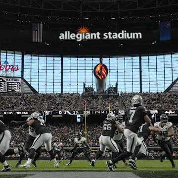 Nov 2, 2025; Paradise, Nevada, USA; A general overall view as Las Vegas Raiders quarterback Geno Smith (7) throws the ball against the Jacksonville Jaguars at Allegiant Stadium. Mandatory Credit: Kirby Lee-Imagn Images