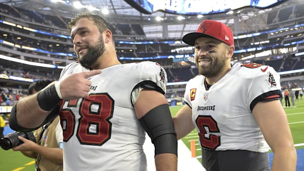 Tampa Bay Buccaneers guard Ben Bredeson (68) and quarterback Baker Mayfield (6)  