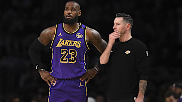 Los Angeles Lakers forward LeBron James (23) with Los Angeles Lakers head coach JJ Redick against the Phoenix Suns during the first half at Crypto.com Arena.