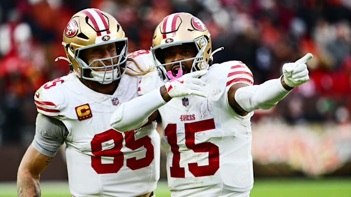 San Francisco 49ers wide receiver Jauan Jennings (15) celebrates with tight end George Kittle (85)