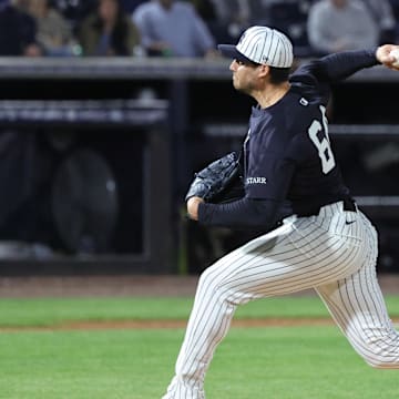 Mar 7, 2025; Tampa, Florida, USA;  New York Yankees pitcher Geoff Hartlieb (64) throws a pitch during the fourth inning against the Toronto Blue Jays at George M. Steinbrenner Field. Mandatory Credit: Kim Klement Neitzel-Imagn Images