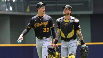 Jul 11, 2024; Milwaukee, Wisconsin, USA;  Pittsburgh Pirates pitcher Paul Skenes (30) walks in with catcher Yasmani Grandal (6) before game against the Milwaukee Brewers at American Family Field. Mandatory Credit: Benny Sieu-USA TODAY Sports