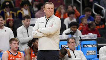 Mar 23, 2025; Milwaukee, WI, USA;  Illinois Fighting Illini head coach Brad Underwood reacts during the first half in the second round of the NCAA Tournament against the Kentucky Wildcats at Fiserv Forum. Mandatory Credit: Jeff Hanisch-Imagn Images