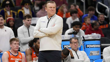Mar 23, 2025; Milwaukee, WI, USA;  Illinois Fighting Illini head coach Brad Underwood reacts during the first half in the second round of the NCAA Tournament against the Kentucky Wildcats at Fiserv Forum. Mandatory Credit: Jeff Hanisch-Imagn Images