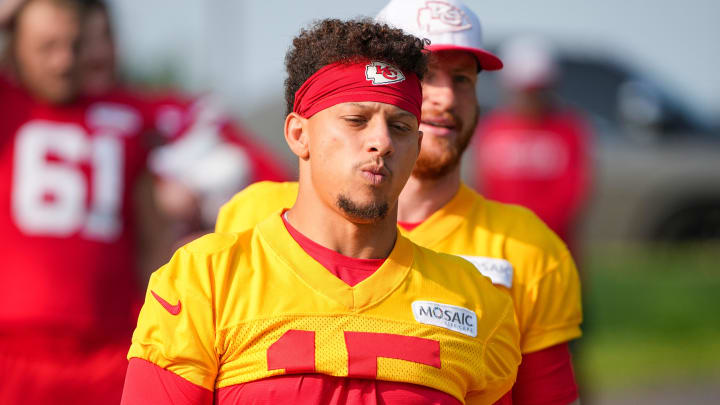 Jul 22, 2024; St. Joseph, MO, USA; Kansas City Chiefs quarterback Patrick Mahomes (15) walks down the hill from the locker room to the fields prior to training camp at Missouri Western State University. Mandatory Credit: Denny Medley-USA TODAY Sports