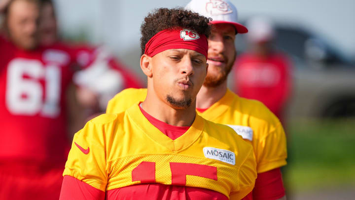 Jul 22, 2024; St. Joseph, MO, USA; Kansas City Chiefs quarterback Patrick Mahomes (15) walks down the hill from the locker room to the fields prior to training camp at Missouri Western State University. Mandatory Credit: Denny Medley-USA TODAY Sports