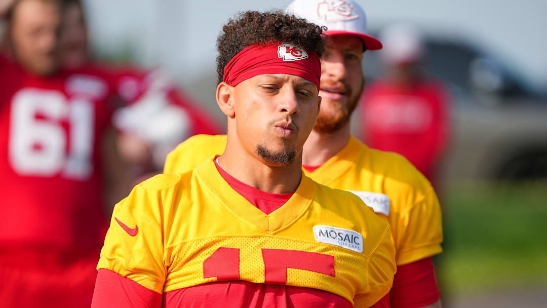 Jul 22, 2024; St. Joseph, MO, USA; Kansas City Chiefs quarterback Patrick Mahomes (15) walks down the hill from the locker room to the fields prior to training camp at Missouri Western State University. Mandatory Credit: Denny Medley-Imagn Images