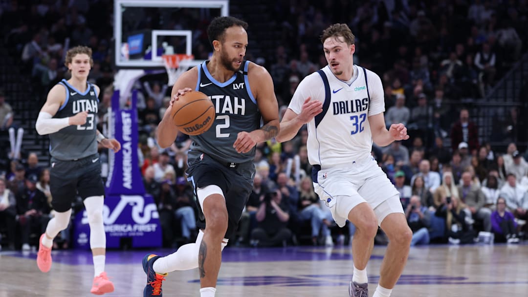 Jan 8, 2026; Salt Lake City, Utah, USA; Utah Jazz forward Kyle Anderson (2) brings the ball up the court against Dallas Mavericks forward Cooper Flagg (32) during the second half at Delta Center. Mandatory Credit: Rob Gray-Imagn Images