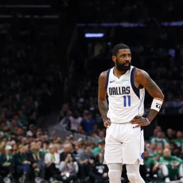 Jun 9, 2024; Boston, Massachusetts, USA; Dallas Mavericks guard Kyrie Irving (11) reacts after a play against the Boston Celtics during the first quarter in game two of the 2024 NBA Finals at TD Garden. Mandatory Credit: Peter Casey-USA TODAY Sports