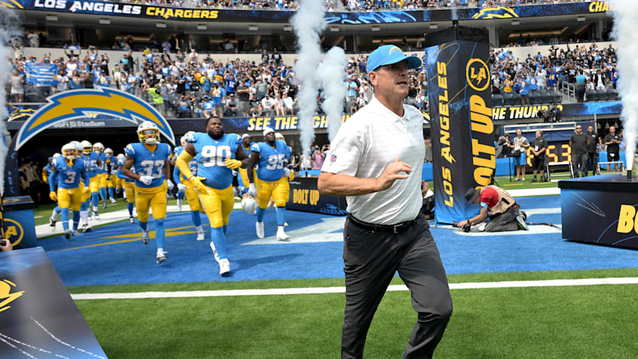 Sep 8, 2024; Inglewood, California, USA; Los Angeles Chargers head coach Jim Harbaugh leads the team on to the field for the game against the Las Vegas Raiders at SoFi Stadium. Mandatory Credit: Jayne Kamin-Oncea-Imagn Images | Jayne Kamin-Oncea-Imagn Images