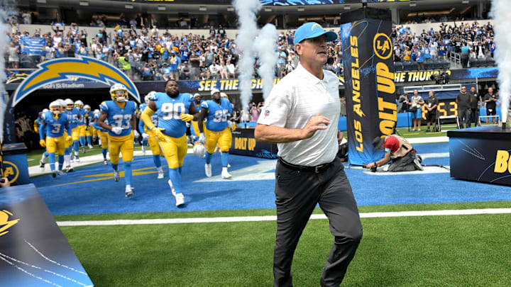 Sep 8, 2024; Inglewood, California, USA; Los Angeles Chargers head coach Jim Harbaugh leads the team on to the field for the game against the Las Vegas Raiders at SoFi Stadium. Mandatory Credit: Jayne Kamin-Oncea-Imagn Images