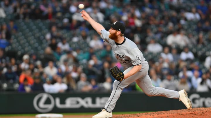 Jun 11, 2024; Seattle, Washington, USA; Chicago White Sox relief pitcher John Brebbia (59) pitches to the Seattle Mariners during the seventh inning at T-Mobile Park.