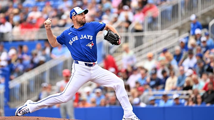 Feb 25, 2025; Dunedin, Florida, USA; Toronto Blue Jays starting pitcher Max Scherzer (31) throws against the St. Louis Cardinals in the first inning of a spring training game at TD Ballpark.