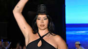 Lauren Chan walks the runway at the Sports Illustrated Swimsuit Runway Show