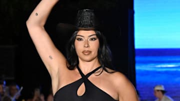 Lauren Chan walks the runway at the Sports Illustrated Swimsuit Runway Show