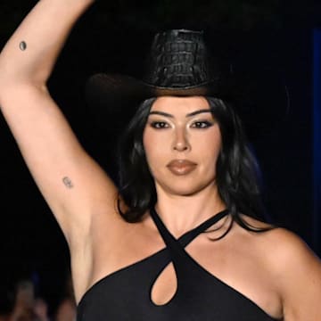Lauren Chan walks the runway at the Sports Illustrated Swimsuit Runway Show