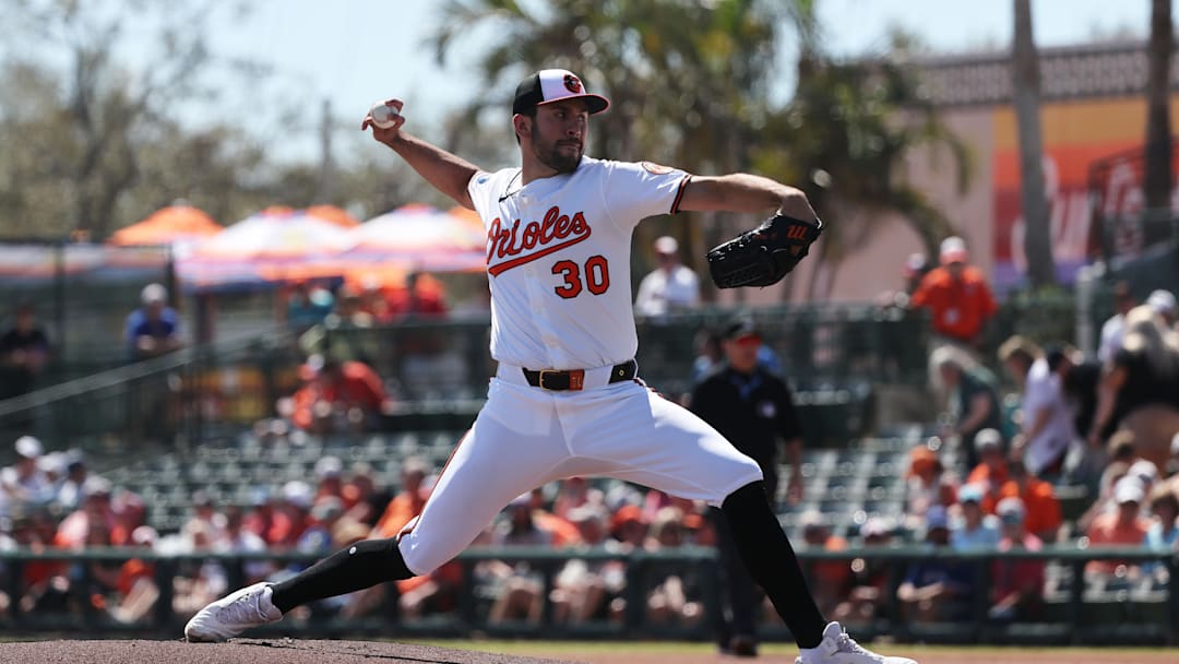 Feb 27, 2025; Sarasota, Florida, USA; Baltimore Orioles starting pitcher Grayson Rodriguez (30) throws a pitch during the first inning against the Toronto Blue Jays  at Ed Smith Stadium. 