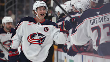 Mar 21, 2025; Pittsburgh, Pennsylvania, USA;  Columbus Blue Jackets center Kent Johnson (91) celebrates with the  Blue Jackets bench after scoring a goal against the Pittsburgh Penguins during the third period at PPG Paints Arena. Mandatory Credit: Charles LeClaire-Imagn Images