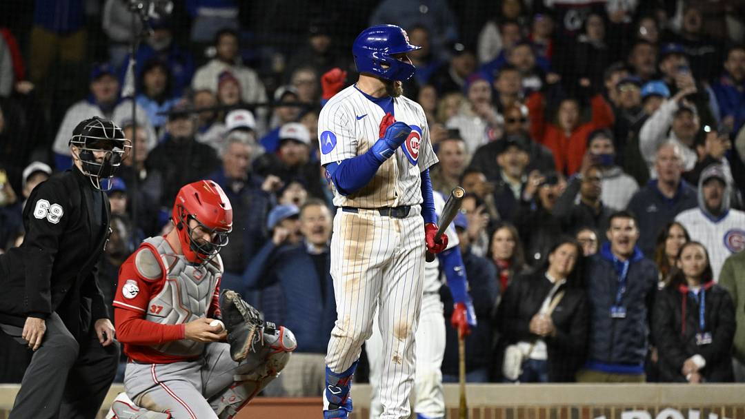 May 6, 2026; Chicago, Illinois, USA;  Chicago Cubs first baseman Michael Busch (29) pumps his fist after being walked during the tenth inning against the Cincinnati Reds  at Wrigley Field. Mandatory Credit: Matt Marton-Imagn Images