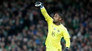 Mike Maignan et l'Équipe de France victorieuse face à l'Irlande