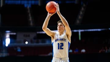 Waukee Northwest's Peyton McCollum (12) shoots a three pointer against Cedar Rapids Kennedy on Monday, March 10, 2025, at Wells Fargo Arena in Des Moines.