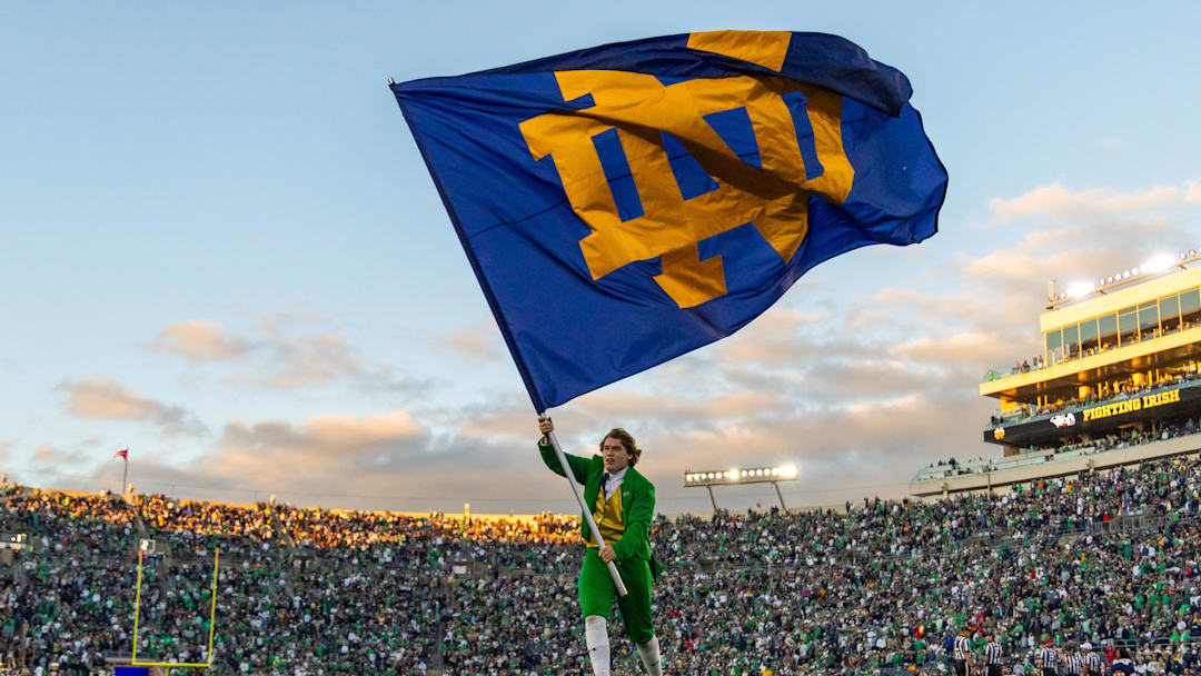 Oct 11, 2025; South Bend, Indiana, USA; The Notre Dame Leprechaun waves an ND flag after a Fighting Irish touchdown against the NC State Wolfpack during the second half at Notre Dame Stadium. Mandatory Credit: Michael Caterina-Imagn Images