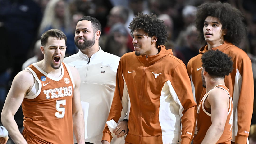 Texas Longhorns forward Camden Heide (5) celebrates with teammates after defeating the Gonzaga Bulldogs during a second round game of the men's 2026 NCAA Tournament at Moda Center. Mandatory Credit: Craig Strobeck-Imagn Images