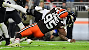 Nov 16, 2025; Cleveland, Ohio, USA; Cleveland Browns defensive end Myles Garrett (95) sacks Baltimore Ravens quarterback Lamar Jackson (8) during the second quarter at Huntington Bank Field. Mandatory Credit: Ken Blaze-Imagn Images
