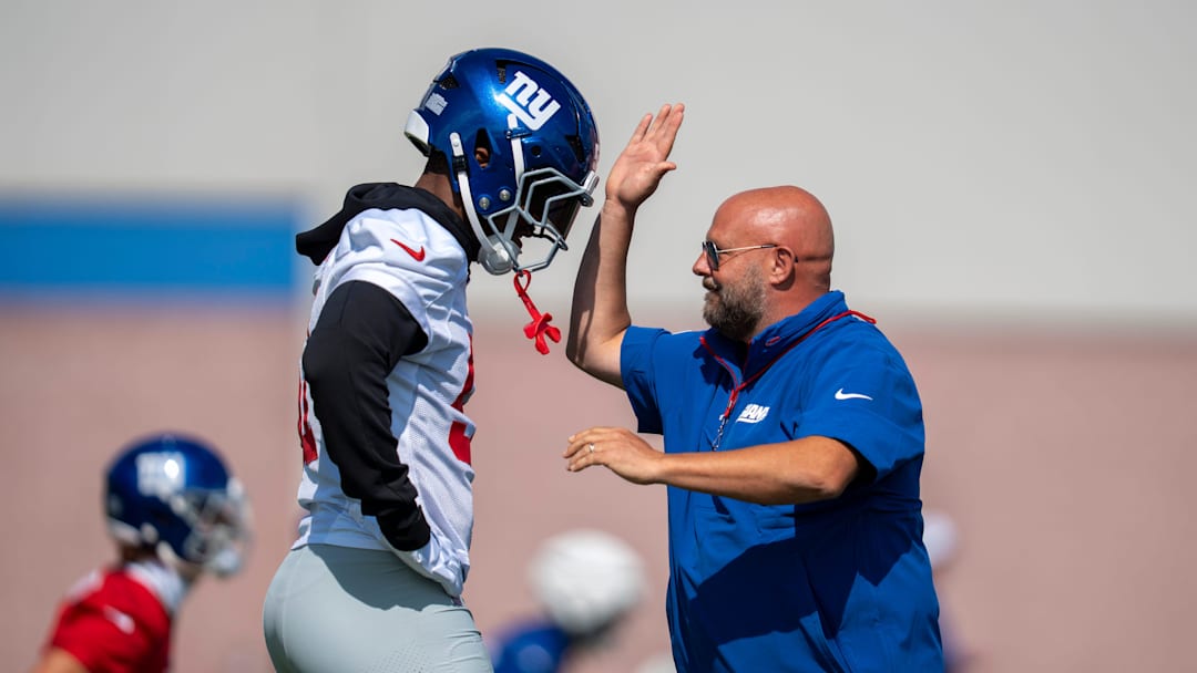 New York Giants Head Coach Brian Daboll speaks with New York Giants linebacker Abdul Carter (51) during day one of the New York Giants training camp at Quest Diagnostics Giants Training Center in East Rutherford on Wednesday, July 23, 2025.