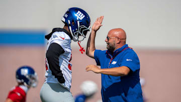 New York Giants Head Coach Brian Daboll speaks with New York Giants linebacker Abdul Carter (51) during day one of the New York Giants training camp at Quest Diagnostics Giants Training Center in East Rutherford on Wednesday, July 23, 2025.