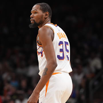Mar 19, 2025; Phoenix, Arizona, USA; Phoenix Suns forward Kevin Durant (35) looks on against the Chicago Bulls during the second half at PHX Aena. Mandatory Credit: Joe Camporeale-Imagn Images