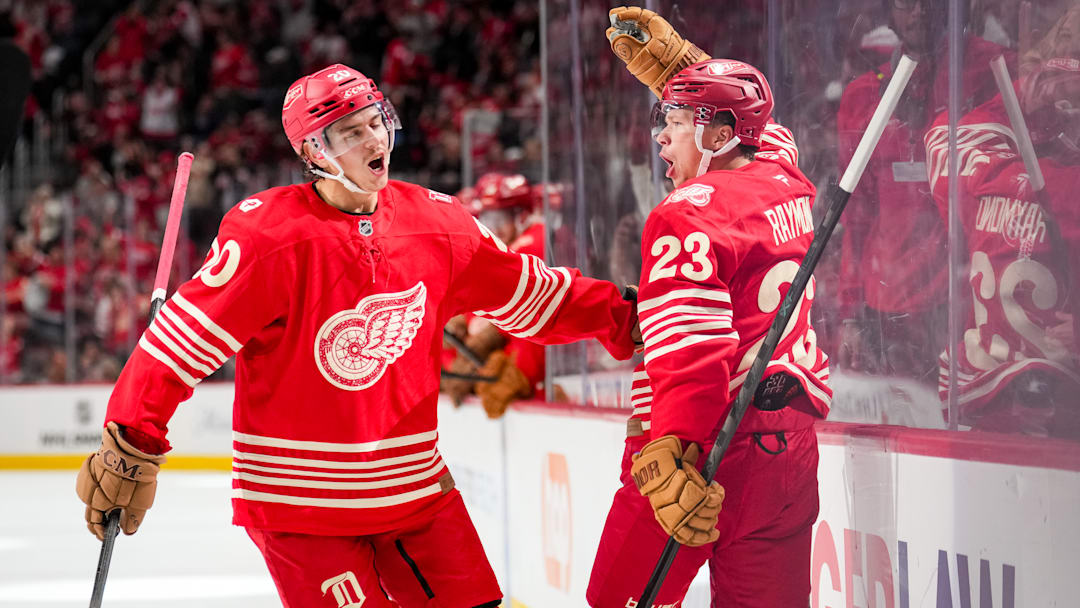 Albert Johansson (left) and Lucas Raymond celebrate as the Detroit Red Wings score against the Toronto Maple Leafs. Albert Johansson (left) and Lucas Raymond celebrate as the Detroit Red Wings score against the Toronto Maple Leafs.