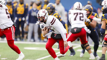 Nov 29, 2025; Morgantown, West Virginia, USA; Texas Tech Red Raiders quarterback Behren Morton (2) runs the ball during the second quarter against the West Virginia Mountaineers at Milan Puskar Stadium. Mandatory Credit: Ben Queen-Imagn Images