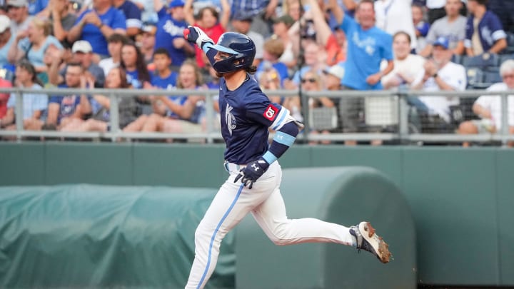 Jul 19, 2024; Kansas City, Missouri, USA; Kansas City Royals shortstop Bobby Witt Jr. (7) celebrates toward fans while running the bases after hitting a solo home run in the first inning at Kauffman Stadium.