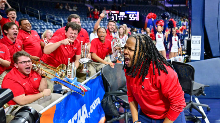 Mar 23, 2024; South Bend, Indiana, USA; Ole Miss Rebels head coach Yolett McPhee-McCuin celebrates with the Ole Miss band after defeating the Marquette Golden Eagles 67-55 in the first round of the NCAA Tournament at the Purcell Pavilion. Mandatory Credit: Matt Cashore-USA TODAY Sports