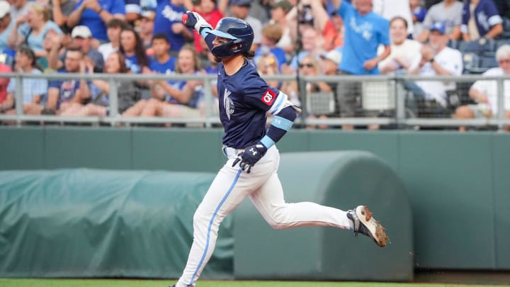 Jul 19, 2024; Kansas City, Missouri, USA; Kansas City Royals shortstop Bobby Witt Jr. (7) celebrates toward fans while running the bases after hitting a solo home run in the first inning at Kauffman Stadium. Mandatory Credit: Denny Medley-USA TODAY Sports