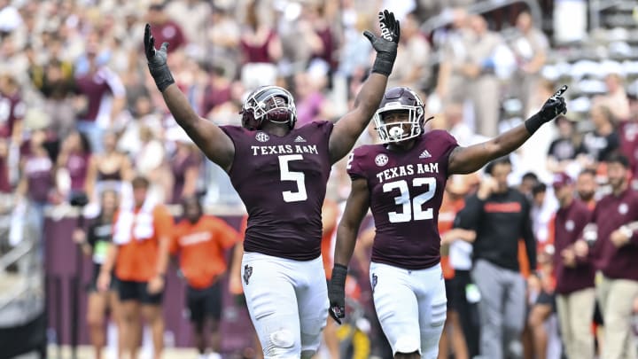 Sep 3, 2022; College Station, Texas, USA; Texas A&M Aggies defensive lineman Shemar Turner (5) celebrates his sack on Sam Houston State Bearkats quarterback Jordan Yates (not pictured) during the first quarter at Kyle Field. 