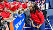 Mar 23, 2024; South Bend, Indiana, USA; Ole Miss Rebels head coach Yolett McPhee-McCuin celebrates with the Ole Miss band after defeating the Marquette Golden Eagles 67-55 in the first round of the NCAA Tournament at the Purcell Pavilion. Mandatory Credit: Matt Cashore-Imagn Images