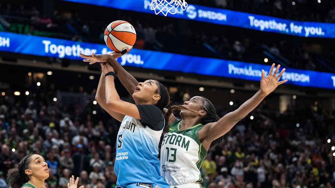 Aug 30, 2025; Seattle, Washington, USA; Chicago Sky forward Angel Reese (5) shoots the ball against Seattle Storm forward Ezi Magbegor (13) during the second half at Climate Pledge Arena. Mandatory Credit: Stephen Brashear-Imagn Images Aug 30, 2025; Seattle, Washington, USA; Chicago Sky forward Angel Reese (5) shoots the ball against Seattle Storm forward Ezi Magbegor (13) during the second half at Climate Pledge Arena. Mandatory Credit: Stephen Brashear-Imagn Images