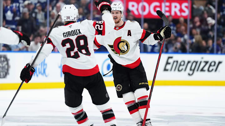 Apr 29, 2025; Toronto, Ontario, CAN; Ottawa Senators  defenseman Thomas Chabot (72) celebrates with right wing Claude Giroux (28) after a goal against the Toronto Maple Leafs in the second period during game five of the first round of the 2025 Stanley Cup Playoffs at Scotiabank Arena. Mandatory Credit: Nick Turchiaro-Imagn Images