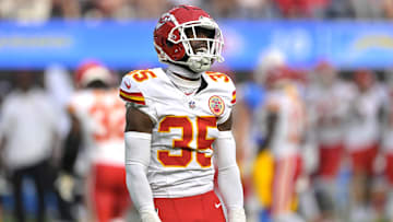 Sep 29, 2024; Inglewood, California, USA;  Kansas City Chiefs cornerback Jaylen Watson (35) celebrates after breaking up a pass for Los Angeles Chargers wide receiver Joshua Palmer (5) in the second half at SoFi Stadium. Mandatory Credit: Jayne Kamin-Oncea-Imagn Images
