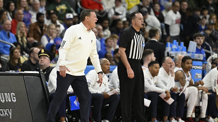 Mar 20, 2025; Providence, RI, USA;  Kansas Jayhawks head coach Bill Self reacts during the first half against the Arkansas Razorbacks at Amica Mutual Pavilion. Mandatory Credit: Eric Canha-Imagn Images