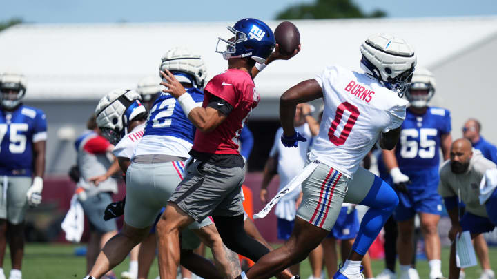 Jul 26, 2024; East Rutherford, NJ, USA; New York Giants quarterback Daniel Jones (8) passes during training camp at Quest Diagnostics Training Center.  