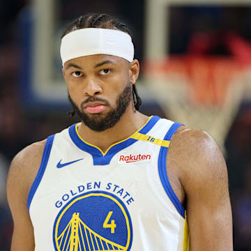 Golden State Warriors guard Moses Moody (4) walks on the court before the start of the first quarter against the LA Clippers at Chase Center. 