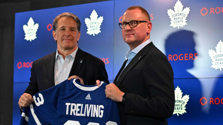 Jun 1, 2023; Toronto, Ontario, CANADA; Toronto Maple Leafs new general manager Brad Treliving is introduced by club president Brendan Shanahan (left) at a press conference at Scotiabank Arena. Mandatory Credit: Dan Hamilton-USA TODAY Sports