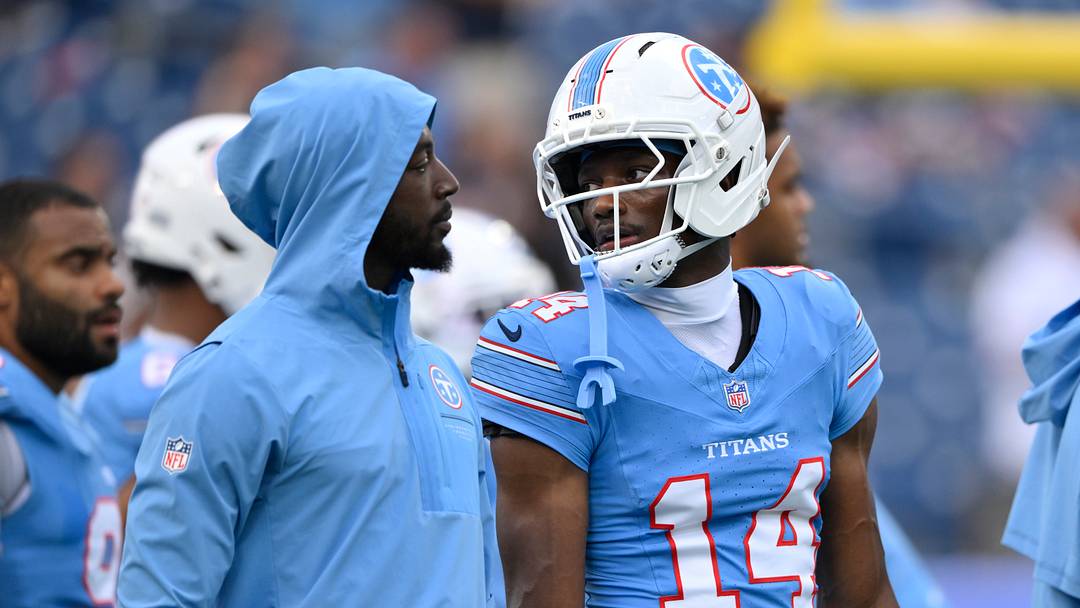 Aug 29, 2026; Nashville, Tennessee, USA;  Tennessee Titans wide receiver Calvin Ridley, left, and wide receiver Carnell Tate (14) look on before the game against the Chicago Bears at Nissan Stadium.  Mandatory Credit: Steve Roberts-Imagn Images
