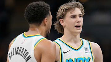Indiana Pacers guard Tyrese Haliburton (0) and wing Johnny Furphy (7)