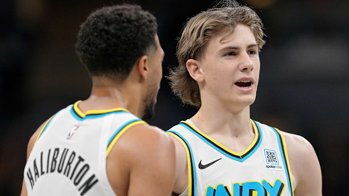 Indiana Pacers guard Tyrese Haliburton (0) and wing Johnny Furphy (7)