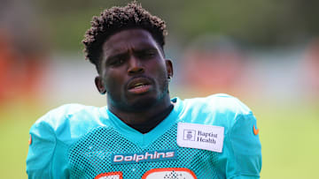 Aug 6, 2024; Miami Gardens, FL, USA; Miami Dolphins wide receiver Tyreek Hill (10) looks on during a joint practice with the Atlanta Falcons at Baptist Health Training Complex. Mandatory Credit: Sam Navarro-Imagn Images