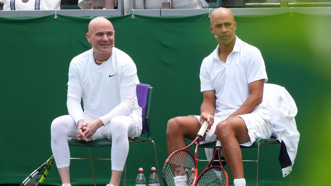 Andre Agassi and James Blake play in an exhibition match at the Wimbledon Court in Central Park. Andre Agassi and James Blake play in an exhibition match at the Wimbledon Court in Central Park.